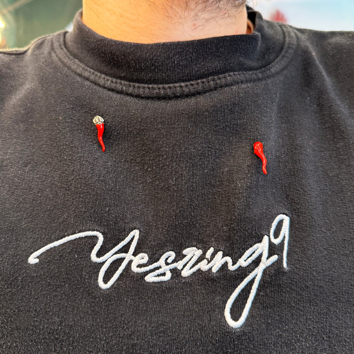 Spilla corno rosso