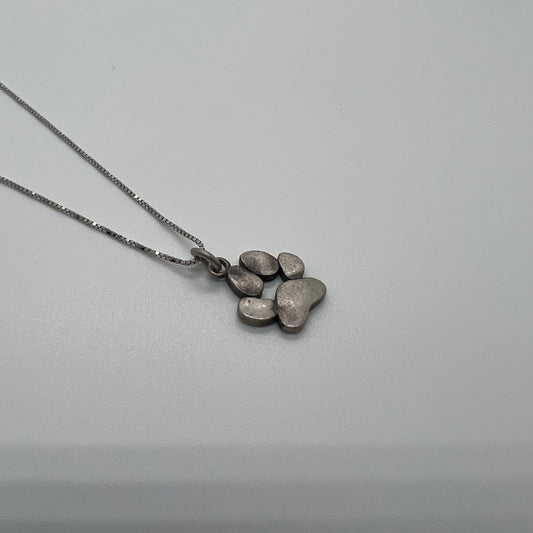 ciondolo zampa cane brunito