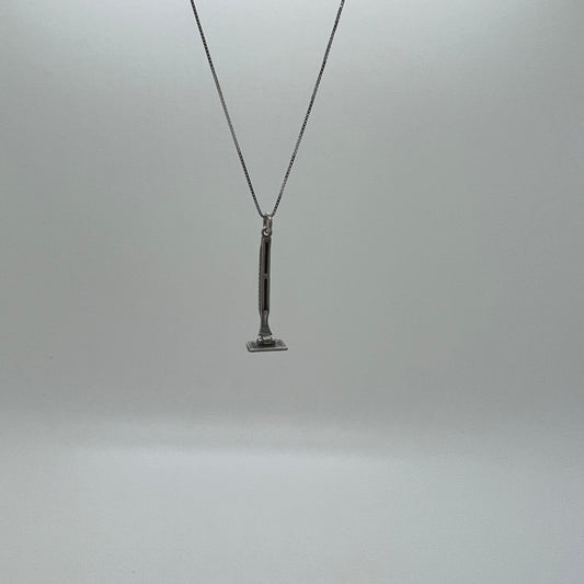 ciondolo rasoio brunito lametta