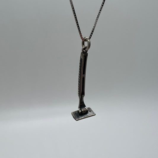 ciondolo rasoio brunito lametta