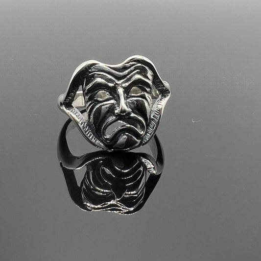 anello maschera piangente teatro