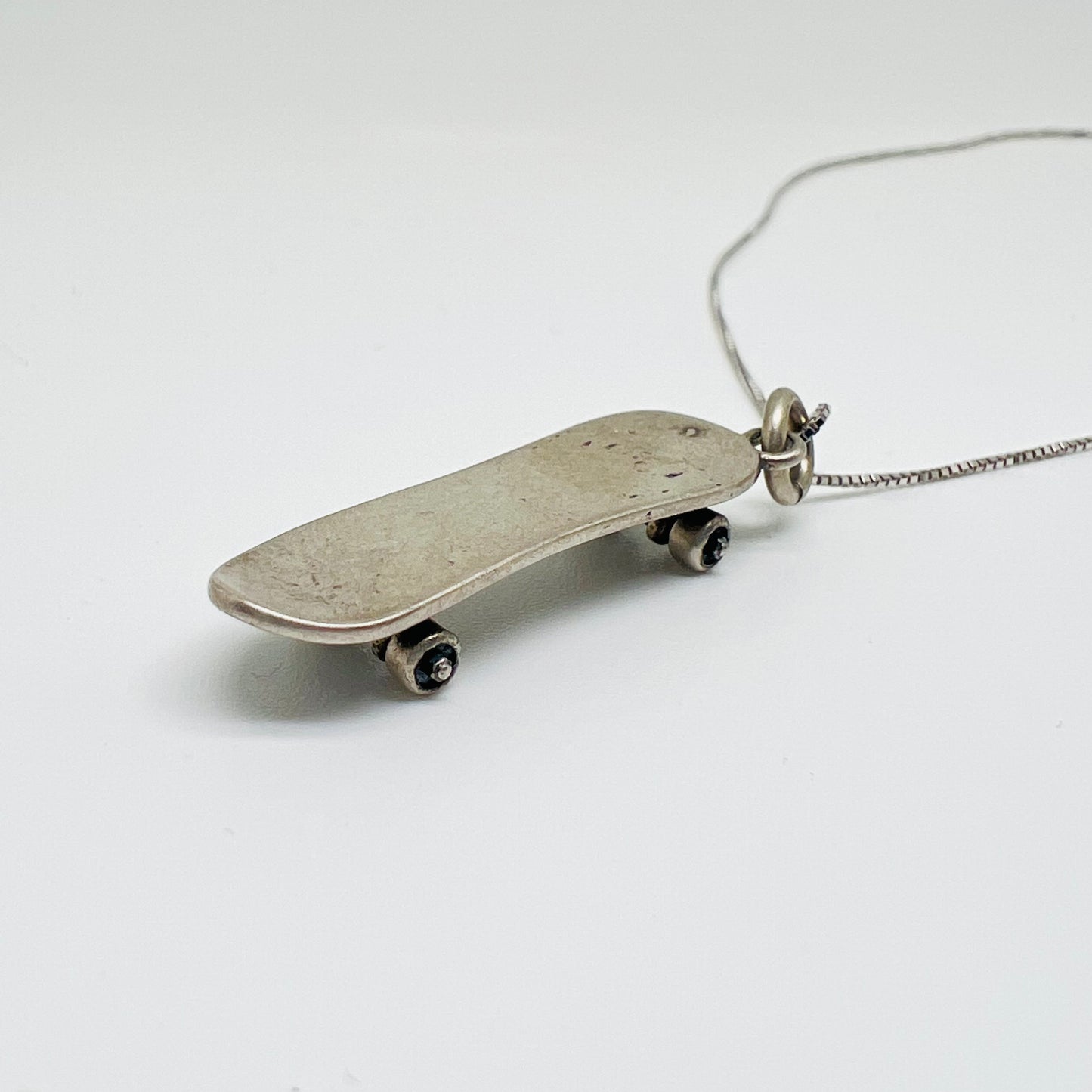 Ciondolo argento skate