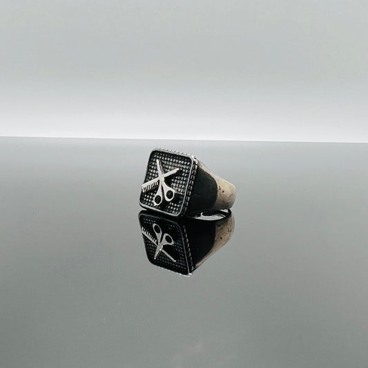 Anello pettine e forbici