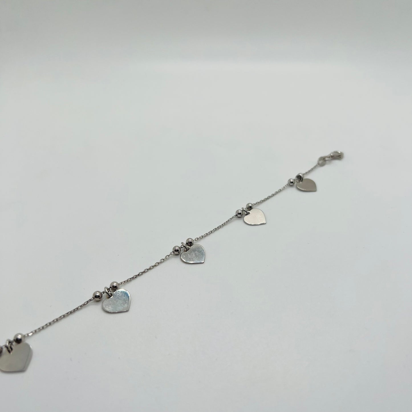 Bracciale argento Cuori pendenti