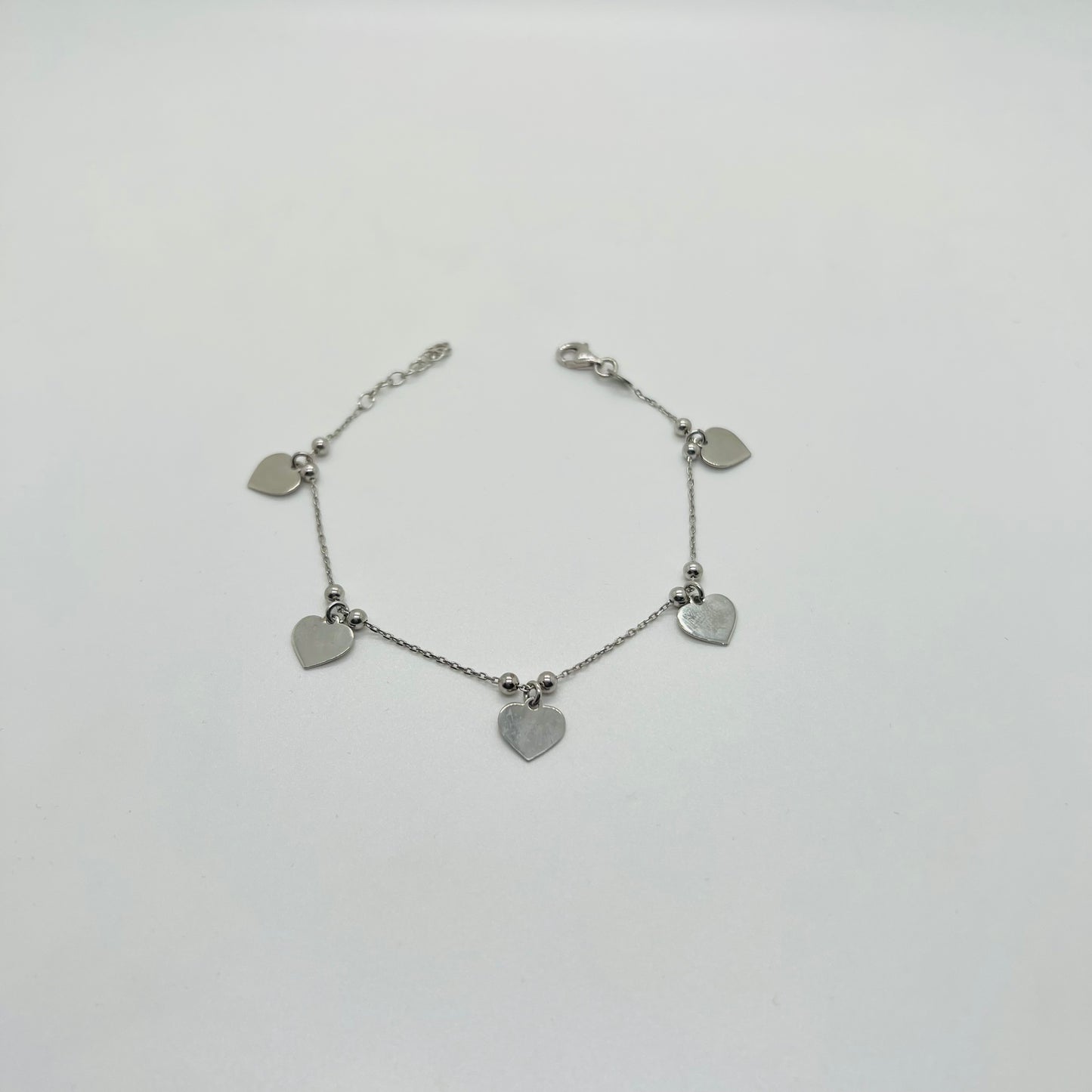 Bracciale argento Cuori pendenti