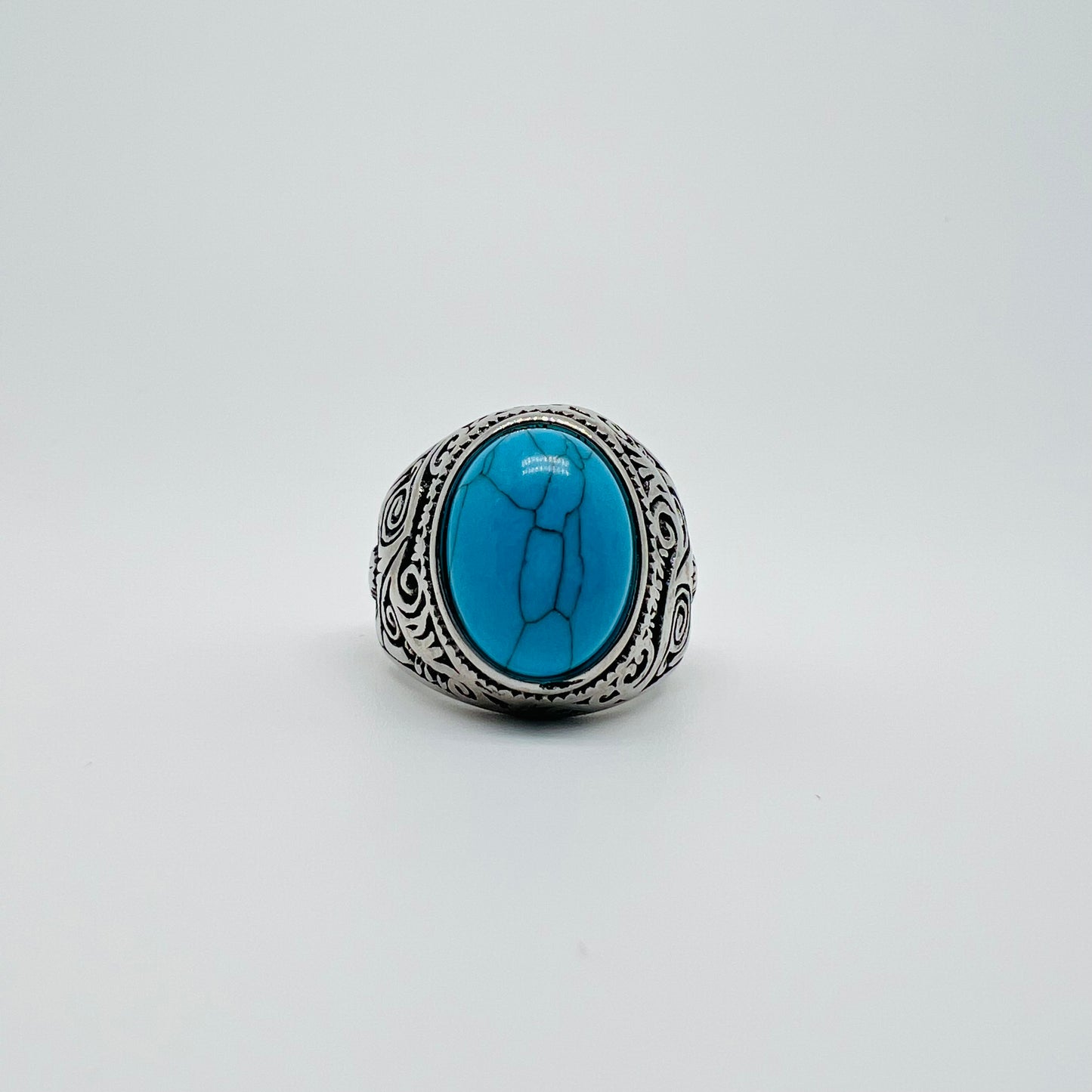 Anello chevalier ovale pietra turchese acciaio