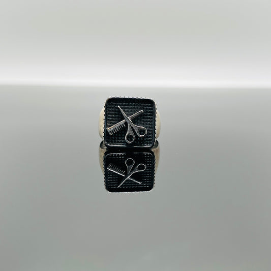 Anello pettine e forbici