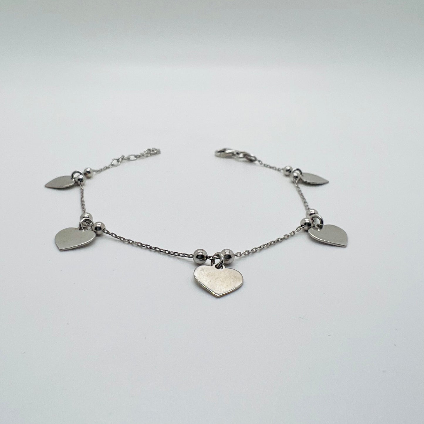 Bracciale argento Cuori pendenti
