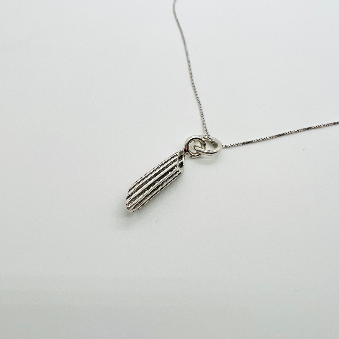 Ciondolo argento pasta penna rigata